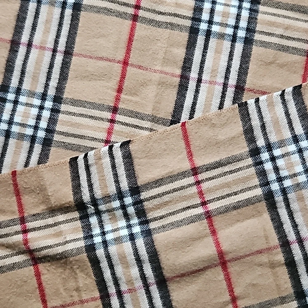 Cashmink plaid scarf, browns, red and black.